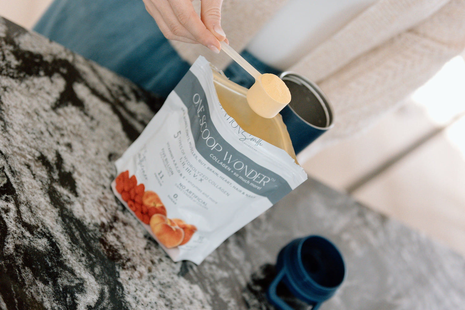 The Southerner peach raspberry flavored ONE SCOOP WONDER Whole Body Wellness Blend shaker bottle