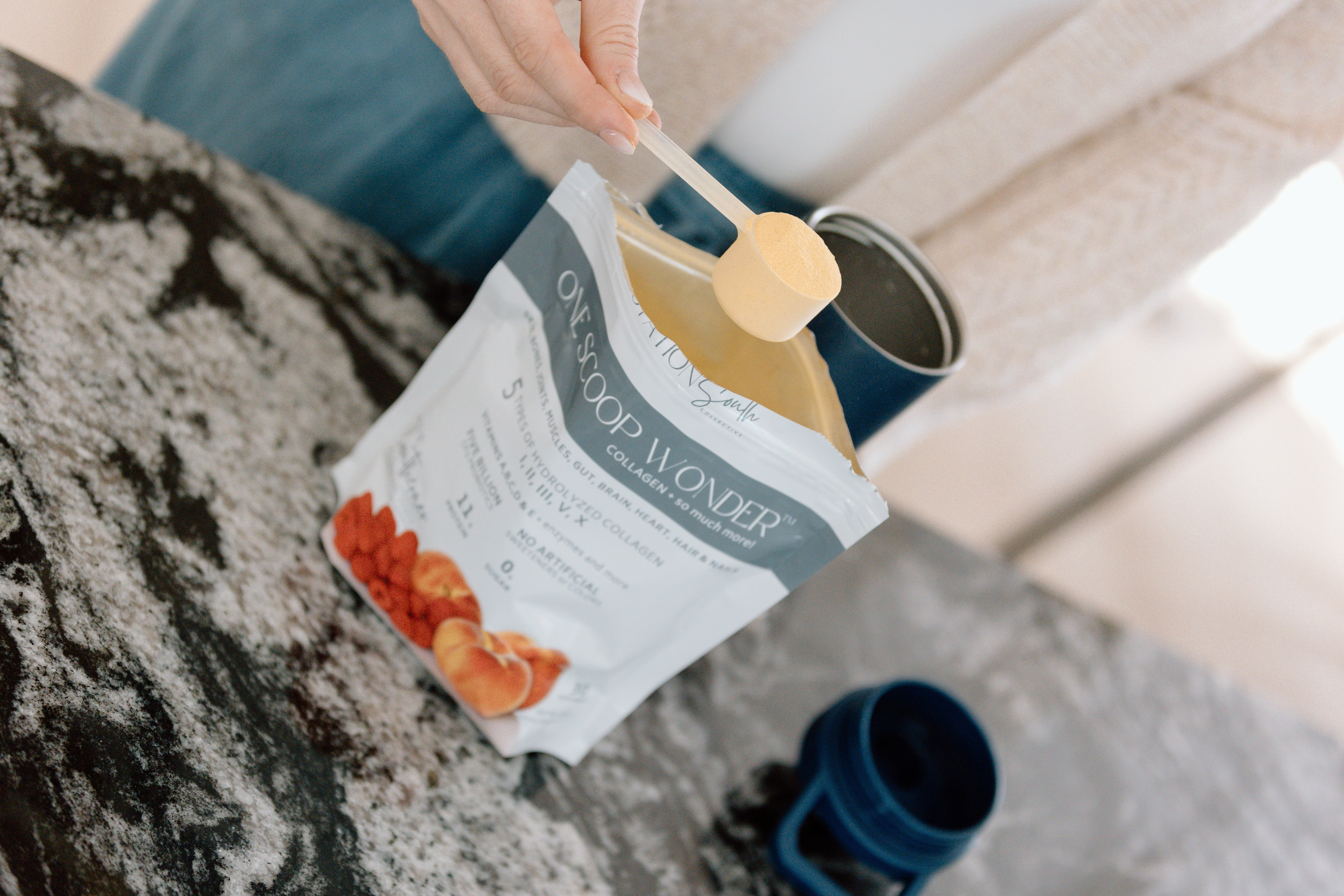 The Southerner peach raspberry flavored ONE SCOOP WONDER Whole Body Wellness Blend shaker bottle